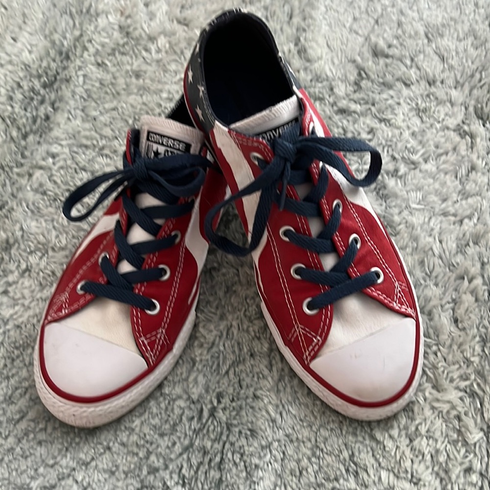 Red white and blue American flag Converse sneakers.